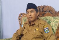 Kepala SMAN 1 Pringgarata Akhmad Husni (Erwin for Koran Mandalika)